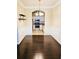 Dining room with dark hardwood floors and kitchen view at 1850 Cotillion Dr # 3221, Dunwoody, GA 30338