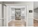 Elegant elevator lobby with hardwood floors and modern finishes at 1850 Cotillion Dr # 3221, Dunwoody, GA 30338