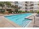 Inviting rectangular pool with ample deck space at 1850 Cotillion Dr # 3221, Dunwoody, GA 30338