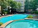 Relaxing pool area with a spa and ample seating at 1850 Cotillion Dr # 3221, Dunwoody, GA 30338