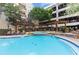 Refreshing swimming pool and spa with ample seating at 1850 Cotillion Dr # 3221, Dunwoody, GA 30338