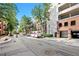 Residential street view with building, parking, and FedEx truck at 1850 Cotillion Dr # 3221, Dunwoody, GA 30338