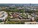 Aerial view of townhomes in a wooded area with a city skyline at 2380 Crescent Park Ct # 4, Atlanta, GA 30339
