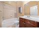 Bathroom with a tub and shower combination and a dark wood vanity at 2380 Crescent Park Ct # 4, Atlanta, GA 30339