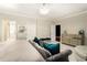 Bright bedroom complete with a sitting area and an ample amount of space, perfect for ultimate relaxation and comfort at 980 Fenimore Cir, Sandy Springs, GA 30350