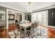 Formal dining area with modern decor and a view to other rooms in the house at 980 Fenimore Cir, Sandy Springs, GA 30350