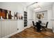 Dining area featuring modern chandelier, art, and a table with black chairs at 980 Fenimore Cir, Sandy Springs, GA 30350