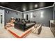 Home theater room with projector screen, comfortable seating, and stylish decor at 980 Fenimore Cir, Sandy Springs, GA 30350