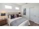 Cozy bedroom features a comfortable bed, soft lighting, and modern decor at 332 Olmstead Way # 38, Alpharetta, GA 30022