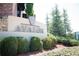 The community entrance features attractive signage and lush landscaping that creates a welcoming atmosphere at 332 Olmstead Way # 38, Alpharetta, GA 30022