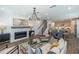 Open-concept floor plan showcasing the living room, dining area, kitchen and staircase at 332 Olmstead Way # 38, Alpharetta, GA 30022