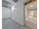 Unfinished basement with white-painted corrugated metal ceiling and neutral colored walls at 2423 Rosapenna Nw Ln, Kennesaw, GA 30152