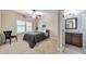 This charming bedroom features natural light and an adjacent bathroom, providing a relaxing and convenient private retreat at 2423 Rosapenna Nw Ln, Kennesaw, GA 30152