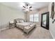 Inviting bedroom with a neutral color palette and comfortable furnishings, offering a peaceful space for rest and relaxation at 2423 Rosapenna Nw Ln, Kennesaw, GA 30152