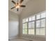 Bedroom featuring high ceilings, large windows, and plenty of natural light at 2423 Rosapenna Nw Ln, Kennesaw, GA 30152