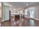 Spacious kitchen featuring stainless appliances, a central island, and hardwood flooring, perfect for cooking and entertaining at 2423 Rosapenna Nw Ln, Kennesaw, GA 30152
