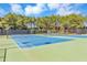 A well-maintained tennis court offers space for recreation and sports within the community at 2423 Rosapenna Nw Ln, Kennesaw, GA 30152