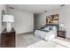 Bedroom featuring plush bedding, natural light, and tasteful decor at 3184 Wood Valley Nw Rd, Atlanta, GA 30327