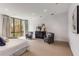 Spacious bedroom with a seating area, large windows and natural light at 3184 Wood Valley Nw Rd, Atlanta, GA 30327