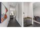 Modern hallway with sleek bar area and view to the kitchen at 3184 Wood Valley Nw Rd, Atlanta, GA 30327