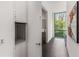Hallway featuring access to an elevator and art at 3184 Wood Valley Nw Rd, Atlanta, GA 30327