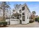 Modern home boasting multiple balconies and outdoor spaces, perfect for enjoying views and entertaining guests at 3184 Wood Valley Nw Rd, Atlanta, GA 30327