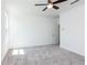Bright bedroom with modern ceiling fan and neutral color scheme at 344 Olmstead Way # 32, Alpharetta, GA 30022