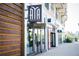 Modern storefront with a sign that reads 'Medical Spa' with reflective glass entryway at 344 Olmstead Way # 32, Alpharetta, GA 30022