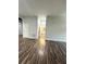Hardwood floor living room with access to bathroom and bedroom at 425 Chapel Sw St # 1206, Atlanta, GA 30313
