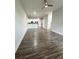 Open concept living room with kitchen and hardwood floors at 425 Chapel Sw St # 1206, Atlanta, GA 30313