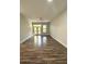Spacious living room with hardwood floors and access to a balcony at 425 Chapel Sw St # 1206, Atlanta, GA 30313