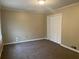 Cozy bedroom with carpeted floor, and a closet with white doors at 300 Flagstone Way, Austell, GA 30168