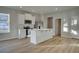 Stylish kitchen featuring stainless steel appliances, white cabinets, and a functional island, perfect for meal prep and dining at 200 Sanctuary Dr, Mcdonough, GA 30253