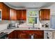 Bright kitchen featuring granite countertops, stainless steel appliances, and ample counter space at 3971 Wolcott Cir # 3971, Atlanta, GA 30340