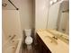 Standard bathroom with laminate countertops and tub with shower at 3589 Main Station Sw Dr, Marietta, GA 30008