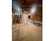 Unfinished attic space featuring plywood flooring and exposed ductwork; ready for customization at 273 Lakeside Pl, Canton, GA 30114