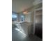 Bathroom with a vanity, mirror, and a view of the outside through a window at 273 Lakeside Pl, Canton, GA 30114