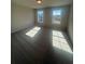 Bedroom featuring neutral colored walls and carpeted floors at 273 Lakeside Pl, Canton, GA 30114