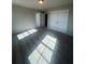 Bedroom featuring neutral colored walls and carpeted floors at 273 Lakeside Pl, Canton, GA 30114