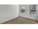 Bedroom with carpet and natural light from windows with wooden blinds at 1813 Hislop Ln, Atlanta, GA 30345