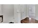 Bright hallway features hardwood floors and white paneled doors, leading to additional rooms at 1813 Hislop Ln, Atlanta, GA 30345