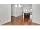 Open floor plan with dark hardwood flooring, white trim, and a kitchen island at 1813 Hislop Ln, Atlanta, GA 30345