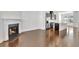 Open floor plan with fireplace, stainless appliances, granite countertops and island at 1813 Hislop Ln, Atlanta, GA 30345