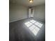 Bright bedroom with large window offering plenty of natural light at 277 Lakeside Pl, Canton, GA 30114