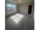 Bright bedroom with large window offering plenty of natural light at 277 Lakeside Pl, Canton, GA 30114