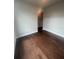 Cozy room featuring hardwood floors and neutral paint at 277 Lakeside Pl, Canton, GA 30114