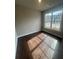 Bright bedroom with large window, hardwood floors, and natural light at 277 Lakeside Pl, Canton, GA 30114