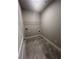 Practical laundry room featuring tiled floors and wire shelving at 277 Lakeside Pl, Canton, GA 30114