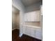 Kitchen pantry featuring a large storage area with custom built in shelving at 277 Lakeside Pl, Canton, GA 30114