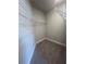 Walk-in closet featuring multiple wire rack shelves for optimal storage and organization at 277 Lakeside Pl, Canton, GA 30114